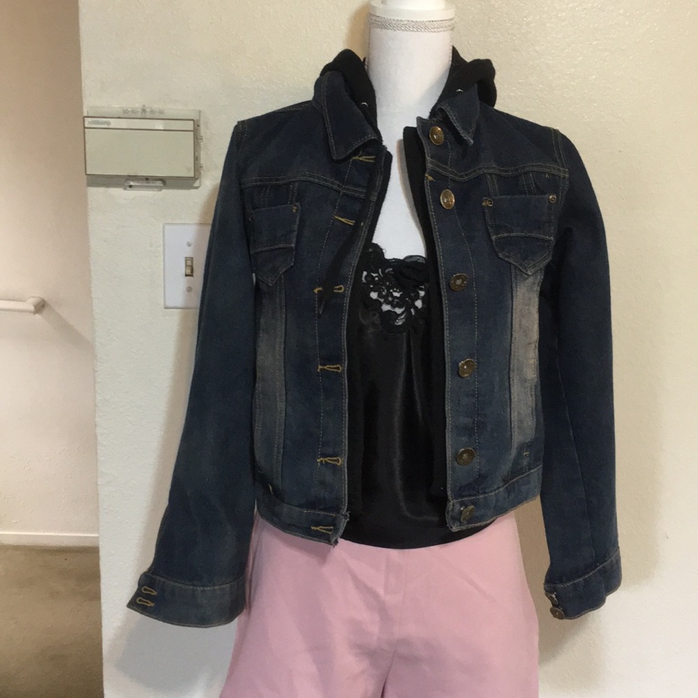 Layered denim jacket with a hoodie